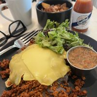 Vegan GF Chorizo Rancheros, Side Crispy Potatoes and Matcha Late w/ Almond Mlk.   at Blvd Cafe in Sarasota
