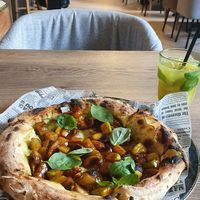 Pizza with baked vegetables and sesame sauce at Salsa Bistro in Vitebsk