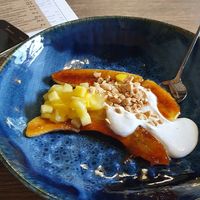 Caramel banana with coconut cream and salted peanuts at Salsa Bistro in Vitebsk