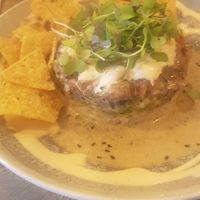 Tomate marinado con un sabor marino exquisito  at Meet Vegano in Malaga