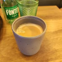 Coffee in stone cup at Meet Vegano in Malaga