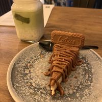 Cheesecake and a Macha latte   at Meet Vegano in Malaga
