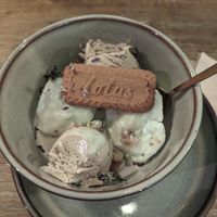 Lotus and black sesame mochis with roasted pistachio ice cream at Meet Vegano in Malaga
