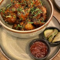 Coliflor con salsa de chipitle y arándano   at Meet Vegano in Malaga