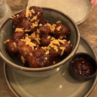 Cauliflower ‘wings’ w ‘parmesan'  at Meet Vegano in Malaga