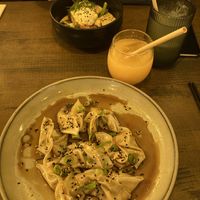 truffle dumplings 🥟 & salmon main dish   at Meet Vegano in Malaga