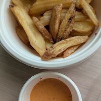Fries with kimchi sauce at Meet Vegano in Malaga