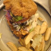 Crunchy meet burger with deep-fried crunchy brioche bun at Meet Vegano in Malaga