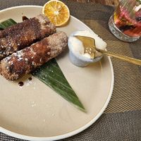 Apple and cinnamon rolls with vegan ice cream. Raspberry mojito at Ayubowan in Glossop