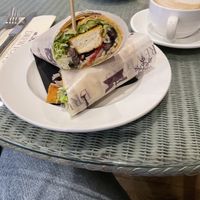 Protein breakfast wrap and oat milk flat white   at Drewton's in Brough