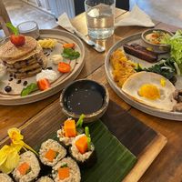 Vegan pancakes, sushi and egg 😍  at Alchemy in Ubud