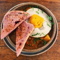 Shakshoka with fried egg and garlic bread  at Alchemy in Ubud