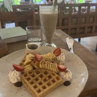 Fluffy waffle with berries and banana smoothie   at Alchemy in Ubud