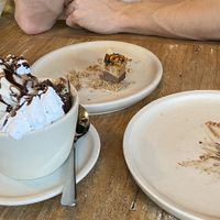 crime scene sundae, tiny leftover piece of snickers cake and empty plate where the silken tofu chocolate cake once was  at Alchemy in Ubud