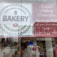 Exterior- Window sign at Kyra's Bakery Connection in Napoleon