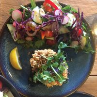 Spiced chickpea salad on charcoal bread with salad   at Susa Plant Based Kitchen in Ryde