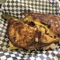 Reuben sammy complete with a tasty pickle!  at Midtown Vegan Deli & Market in Tucson