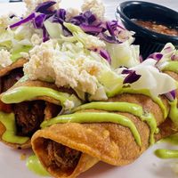 Rolled tacos. Taco types change every Tuesday!  at Midtown Vegan Deli & Market in Tucson