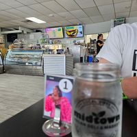 Cute table numbers of plant-based celebrities. at Midtown Vegan Deli & Market in Tucson