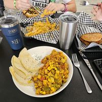 Midtown scramble, sloppy joe (Monday special) animal style fries, tater tots, and the Philly (steak). at Midtown Vegan Deli & Market in Tucson