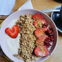 Porridge with fruit, plant yoghurt and granola. at Flour House in Bristol