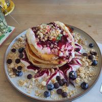 Vegan pancake stack - choc chips, yoghurt and berries at Flour House in Bristol