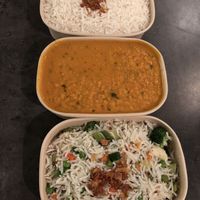 Lentillicious curry, plain rice and rice with vegetables   at Kisaan Restaurant and Patisserie in The Hague