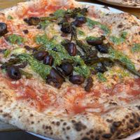 NDUJA ORTOLANA Vegan 'nduja, roasted tenderstem broccoli, Kalamata olives, chestnut mushrooms, finished with rocket pesto  at Rudy's in Manchester