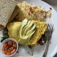 Mom omelette, side of hash browns and "sourdough”  at The Broken Yolk Cafe - Midway Dr in San Diego