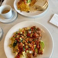 Vegan breakfast bowl and mom omelette with hash browns  at The Broken Yolk Cafe - Midway Dr in San Diego