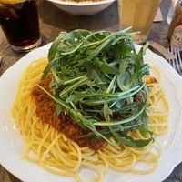 Smaller 'dog’ size spaghetti with rucola topping and tomato sauce with vegan ‘meat’ from ‘De Vegetarische Slager’  at Bavet in Kortrijk