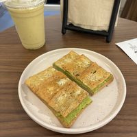 Pesto avocado toast and anti inflammatory smoothie   at Mana Café in Manama