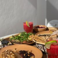 vegan Breakfast, watermelon juice, fruit salad, "bruschetta" and fluffy pancakes at Ethos Vegan Suites in Santorini