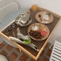Breakfast day 4: pan fried mushrooms, tzatziki and pita, Greek-style pie with a vanilla/custard filling  at Ethos Vegan Suites in Santorini