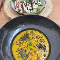 Carrot soup and bowl with tempeh  at Barakokula in Split