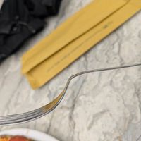 Fork provided with the food. Funny, but not very useful at Pizzeria Trianon da Ciro in Naples