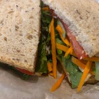 Veggie #2 hummus, carrots, cucumbers, tomatoes, mixed greens, olive oil and vinegar.   at Mountain Deli in Hendersonville