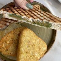 Avocado toast and hash browns   at Busy Bee Cafe in Sliema