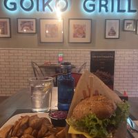 Greta con rustic fries y agua con gasss  at Goiko Grill in Cordoba