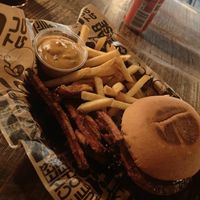 Vegan burger with mixed fries and dip. at Tugg Burgers in Uppsala