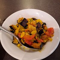 Aubergine with seeds of flat beans at Cafe Mumbai in Totnes