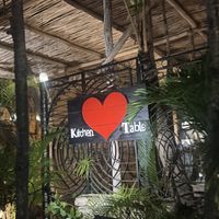   at kitchen table in Tulum