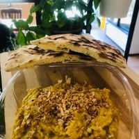 Roasted garlic hummus with naan bread   at Jules' Kitchen in Ipswich