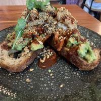 Vegan smashed avocado on toast interesting but kimchi was a bit overpowering    at Source Foods in Perth