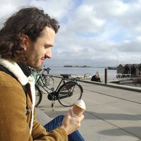 Adam looking at his ice cream like a new born child 😅 at Moo Moo Isbar - Nordhavn in Copenhagen