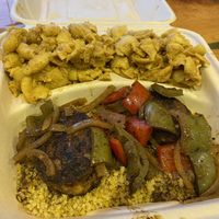 One of a kind House made vegan oxtails with onion bell pepper gravy. Double side of the best Mac and cheese.  at Sir Vegaani in Roanoke