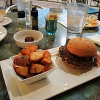 Chipotle black bean burger and garlic new potato side at Pita Jungle - Tucson Oracle in Tucson