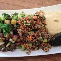 Plate 1 - two different salads, hummus and 1 raw falafel at Botaniq in Copenhagen
