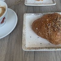 Cappuccino di soia e brioche vegana vuota  at Pasticceria Agostini in Padua