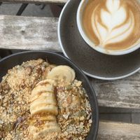 Snickers bowl and cappuccino with oat milk   at Fågel by artizán in Budapest